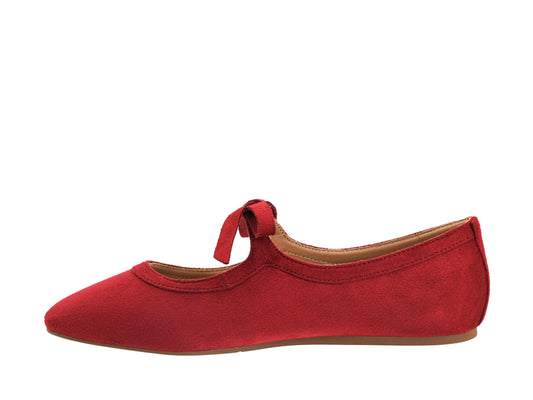 A red suede ballet flat shoe with a pointed toe and a small bow detail on the instep, shown in profile against a plain white background.