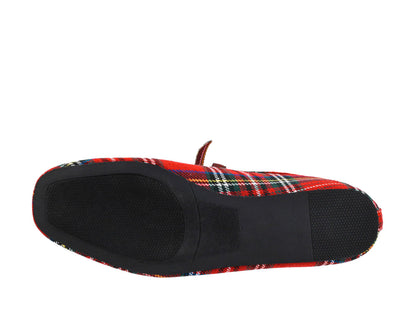 A single slip-on shoe shown from the bottom, featuring a red and black tartan plaid fabric upper with a solid black textured sole.