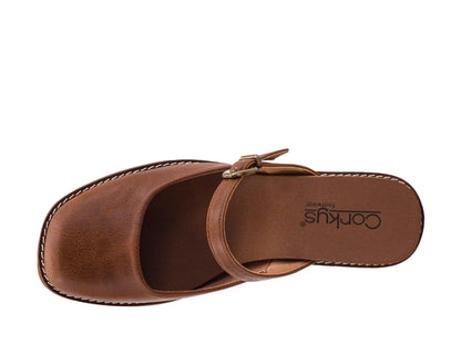 A single brown leather mule sandal shown from a top-down view on a plain white background, featuring a strap with a small metal buckle and the brand name Corkus printed on the footbed.