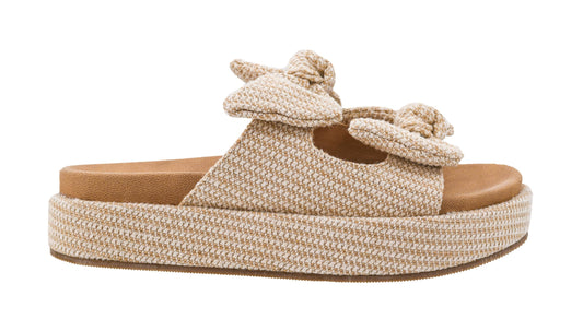 Beige woven sandal with a platform sole on a white background